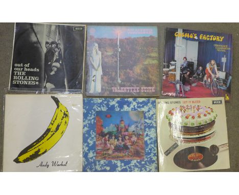 Eight LP records, Rolling Stones, Velvet Underground, Creedence Clearwater Revival and Genesis