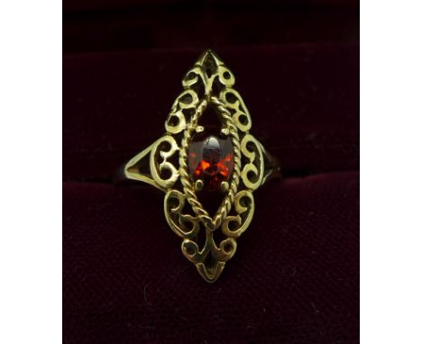 A 9ct gold and red stone ring, 2.3g, M