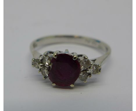 An 18ct gold, ruby and diamond ring, 2.8g, P