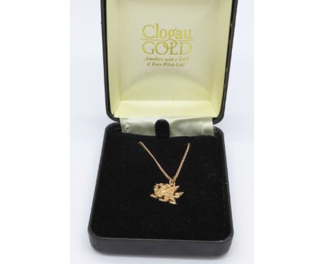 A 9ct Clogau gold Welsh dragon pendant set with a ruby eye with chain, 4.8g, with box