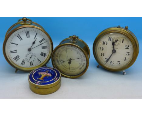 Two brass cased clocks, one made in France, an aneroid barometer, glass a/f and a brass pill box with enamel decoration to th