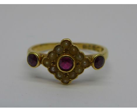 A Victorian 18ct gold, ruby and seed pearl ring, London 1897, O