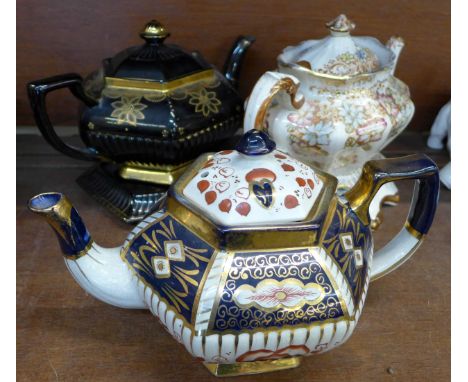 Three Victorian teapots, two with teapot stands including Wade Imari