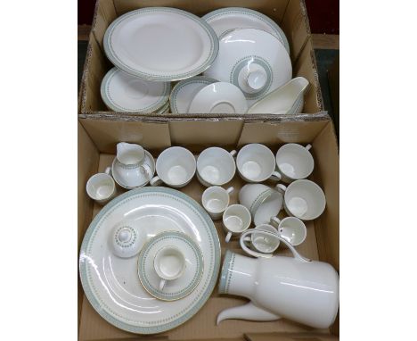 A collection of Royal Doulton Berkshire dinnerware including two tureens, coffee service, chip to coffee pot lid, tea cups an