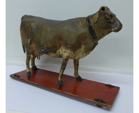 A 19th Century child's pull along automaton toy with growler by Roullet and Descamps, a/f, 37cm