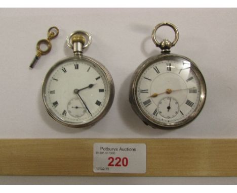 Two silver pocket watches - the first with presentation engraving on inner back plate dated 1923, white enamel dial with subs