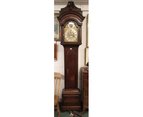 19th century eight day long case clock by Thomas Dawes of Northampton with brass spandrels and silvered dial. Inner Roman num