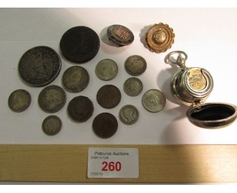 Base metal sovereign case, a Georgian cartwheel penny and small quantity of coins, a 'The Great War Comrades' enamel badge, a