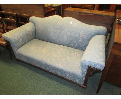 Large three-seater horsehair sofa lately re-upholstered in pale blue fabric with repeating foliate pattern, serpentine back a