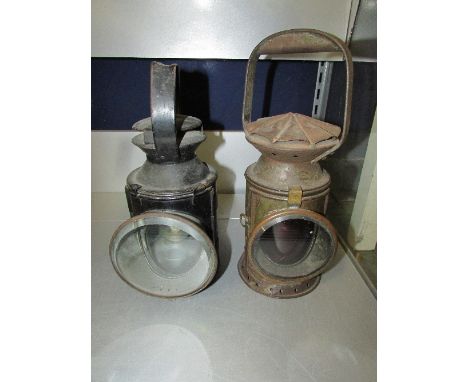 Two railway lamps - one with red filter and marked C Eastgates & Son Ltd 1941 Birmingham with arrow, the other marked B.R