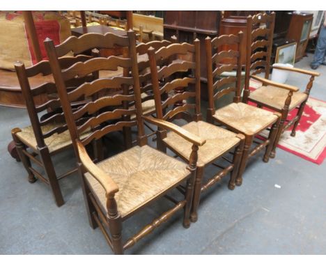 SET OF SIX (FOUR AND TWO) RUSH SEATED LADDER BACK CHAIRS 