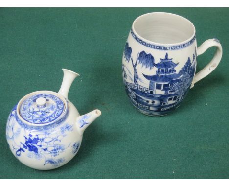 ORIENTAL BLUE AND WHITE TANKARD (AT FAULT) AND BLUE AND WHITE TEAPOT 
