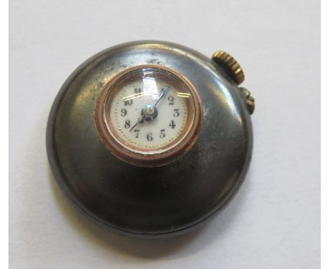 SILVER COLOURED BUTTON HOLE WATCH WITH ENAMELLED DIAL AND GOLD COLOURED MOUNT 