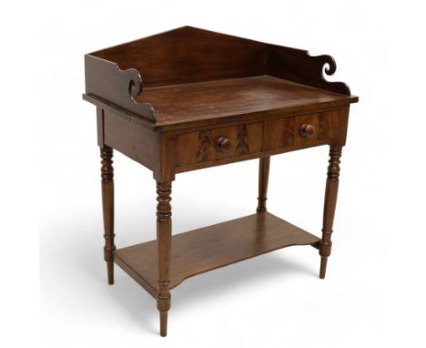 Early Victorian mahogany wash stand, pointed and sloped arch back with shaped and pierced scroll returns, rectangular top ove