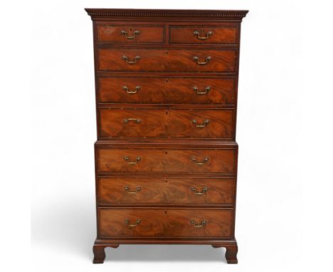 George III mahogany chest-on-chest, projecting moulded and dentil cornice, fitted with two short over six long graduating coc