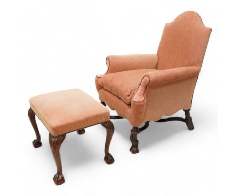 William & Mary design walnut framed armchair, arched cresting rail over rolled arms and C-scrolled arm supports, upholstered 