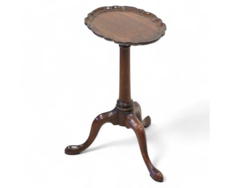 18th century mahogany tripod kettle stand or wine table, shaped and moulded pie crust top on turned pillar, decorated with ca