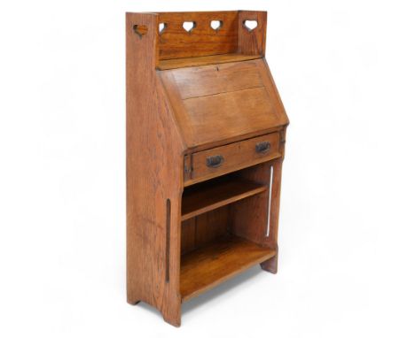 Possibly Liberty & Co - Arts & Crafts light oak bureau, the three-quarter raised gallery pierced with hearts, over a fall-fro