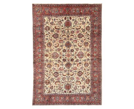 Persian Sarough ivory ground rug, the field decorated with curled leafy branches and palmettes, crimson ground border decorat