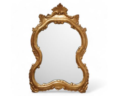 Small 20th century giltwood framed wall mirror, leaf pediment over shaped and moulded frame, with shell and leaf decoration, 