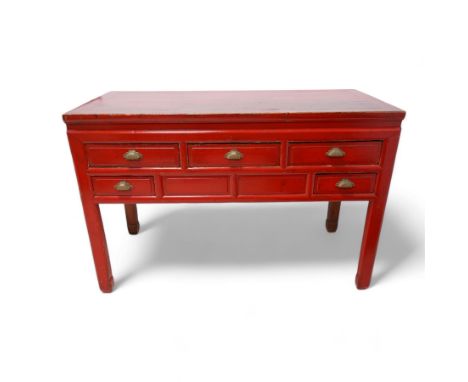 Late 20th century Chinese red lacquered sideboard, the rectangular top over five drawers with brass cup handles, on square su