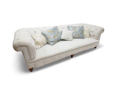 Victorian oak framed three seat Chesterfield sofa, traditional shape, upholstered in deep buttoned ivory and blue patterned f