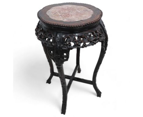 Early 20th century Chinese hardwood and marble top jardiniere or urn stand, shaped circular top with central marble inset and