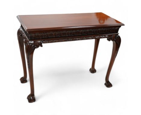 Georgian design mahogany console or side table, moulded rectangular top over palmette carved frieze, decorated with scrolling