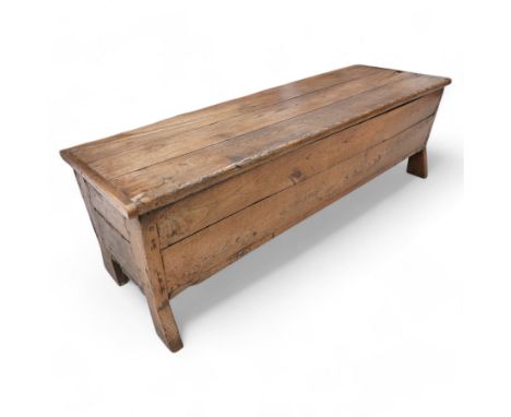 Large 18th century elm pegged and boarded dough bin, three plank top with cleated ends, tapered form with out splayed angular