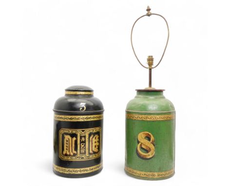 Two Victorian toleware shop display tea canisters, the first decorated in gilt with Chinese writing within laurel leaf border