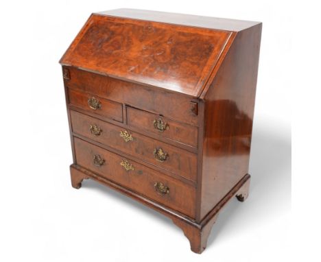 George II walnut and feather banded bureau, moulded fall front enclosing small cupboard, drawers, pigeon holes, baize writing