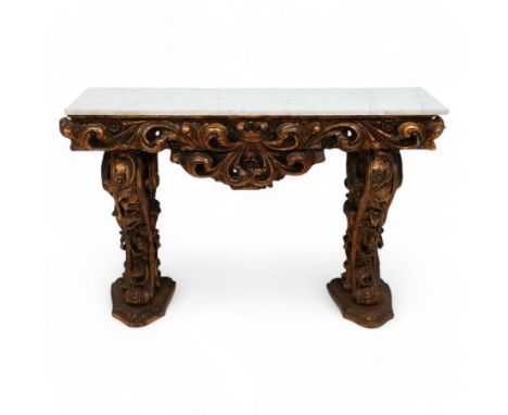 Early 20th century Baroque design ornate giltwood console table with rectangular marble top, the heavily moulded protruding a