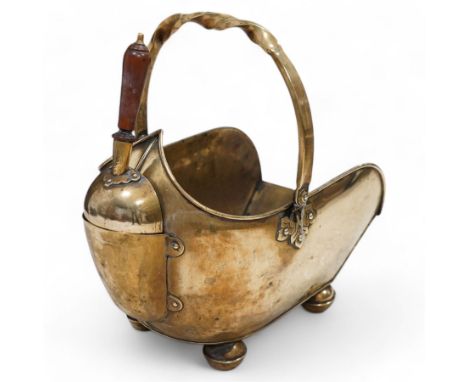 Victorian brass coal scuttle, fitted with arched twist handle and rear coal shovelDimensions: Length/Width:&nbsp;45cm&nbsp; D