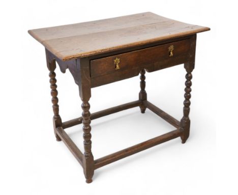 17th century oak side table, two plank rectangular top over single drawer, on bobbin-turned supports united by stretchers Dim