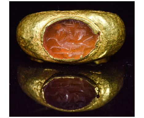 Ca.200 AD. Beautiful Roman Gold Ring with a carnelian stone intaglio depicting a Capricorn. Legions such as Secunda Augusta a