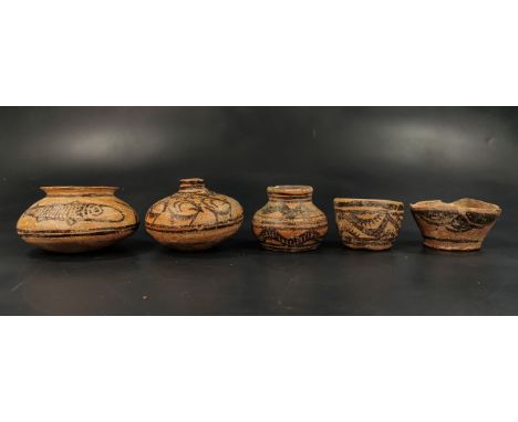 Ca. 2500 BC. Interesting collection of various Indus Valley terracotta vessels of different shapes and sizes, depicting multi