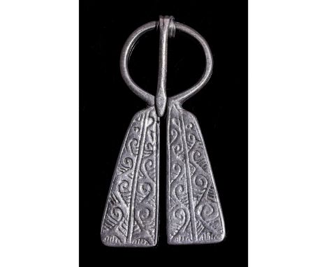 Ca.900- 1100 AD. A fabulous Viking silver cast penannular brooch (fibula) with triskele decoration, This style incorporates t