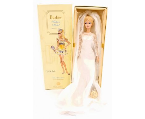 Mattel Silkstone Barbie dressed in Priscilla Presley wedding dress, within Good incorrect Box (ink notation to bottom), unche