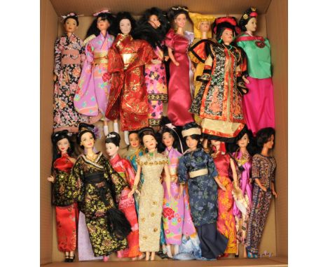 Mattel Barbies x twenty-one, dressed in traditional Chinese, Japanese and other clothing, unchecked for completeness or corre