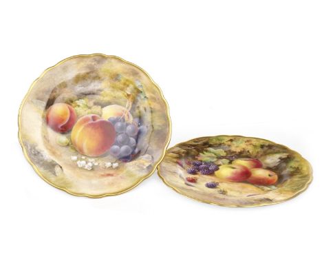 TWO EARLY 20TH CENTURY ROYAL WORCESTER PLATES, of circular shape with scalloped rims, hand painted with fruits in a naturalis