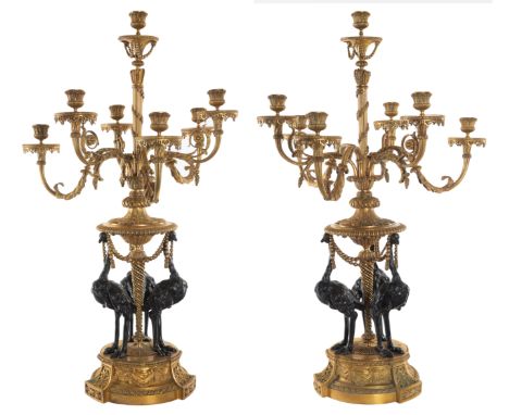 A PAIR OF FRENCH LOUIS XVI STYLE ORMOLU 'CANDELABRES-GIRANDOLES AUX AUTRUCHES' AFTER FRANCOIS REMOND (FRENCH 1747-1812), THIR