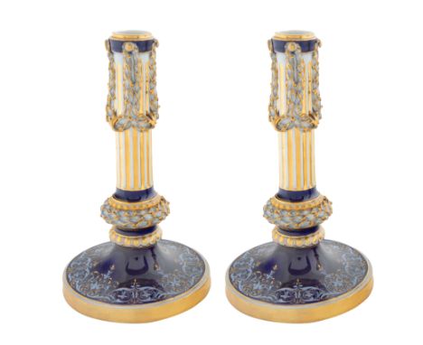 A PAIR OF GERMAN PORCELAIN CANDLESTICKS, MEISSEN, DRESDEN, LATE 19TH CENTURYafter the model by J.C. Schonheit and a drawing b
