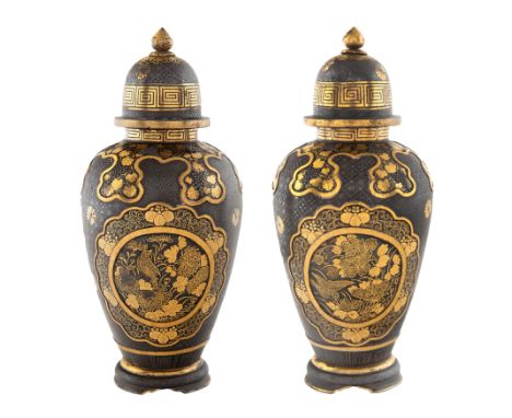 A PAIR OF COVERED JAPANESE MINIATURE URNS, MEIJI PERIOD (1868-1912)each of baluster form, each featuring a landscape with hou