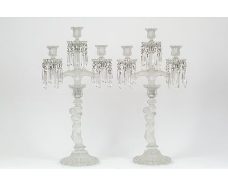 A PAIR OF BACCARAT CRYSTAL 'ENFANT' THREE-LIGHT CANDELABRA, 1970Seach in partly frosted glass with swags of suspending crysta