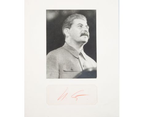 A VINTAGE PHOTOGRAPH OF JOSEPH STALIN TOGETHER WITH HIS AUTOGRAPH photograph signed lower left, measuring 22.5 x 16.5 cm (8 7