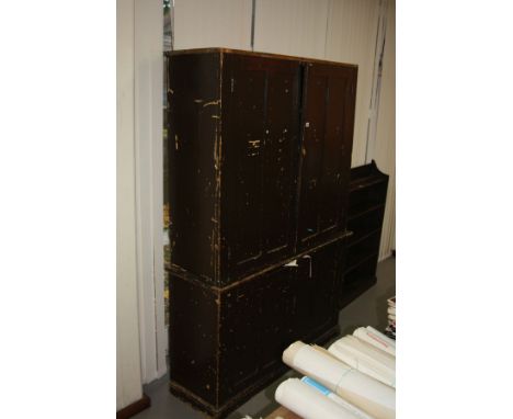 A VICTORIAN PINE TWO PIECE SCHOOL CUPBOARD, painted on the outside and grain pained inside with two doors at the top revealin