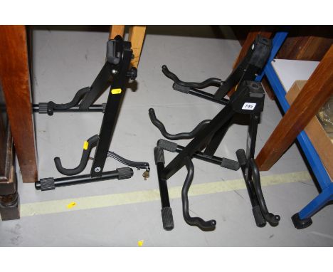 THREE GUITAR STANDS