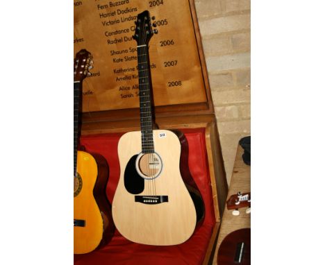 A STAGG SW201LH-N, left handed dreadnought acoustic guitar in natural finish