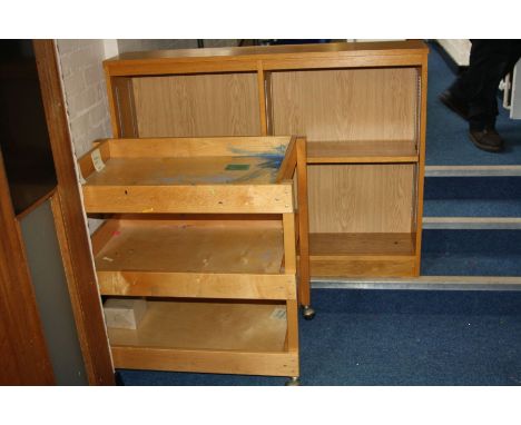 A LIGHT OAK SCHOOL TROLLEY AND A BOOKCASE, 82x55x76cm high and 120x25x91cm high respectively (s.d) 