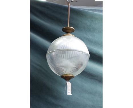 An Art Deco style cellophane glass chandelier of moulded circular form with brass embellishments and an internal light fitmen
